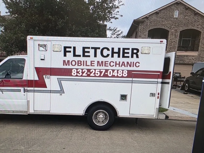 Box truck lettered for a mobile mechanic